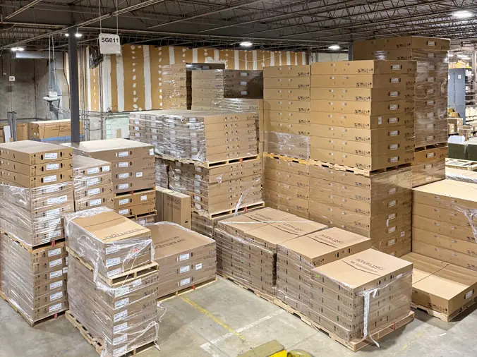 PLumbing supply boxes stacked in rthe plumbing warehouse at McDonald Plumbing Supply in Des Moines Iowa